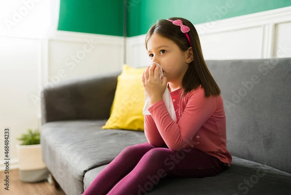 Fototapeta Sick young girl suffering from the flu