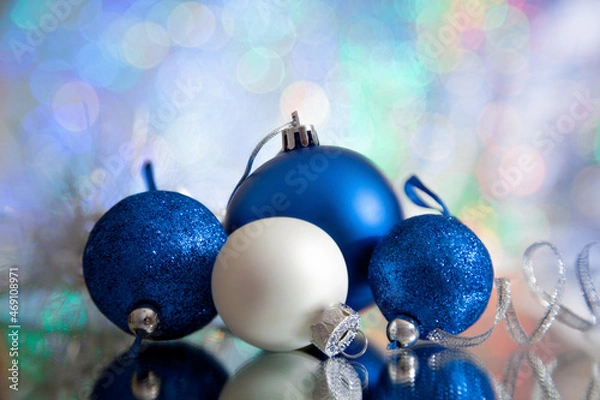 Fototapeta Blue Christmas balls on the abstract background/New Year, Christmas background with Place for text, Copy space for inscription.