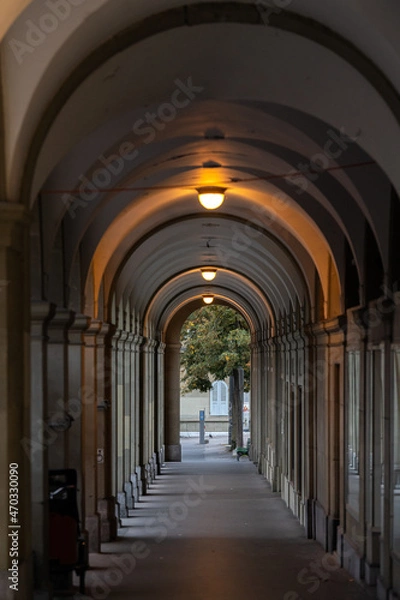 Fototapeta Bern, Switzerland - 2021: Traveling on the streets of this amazing Swiss city, next to its main landmarks. Great architecture and beautiful sights.