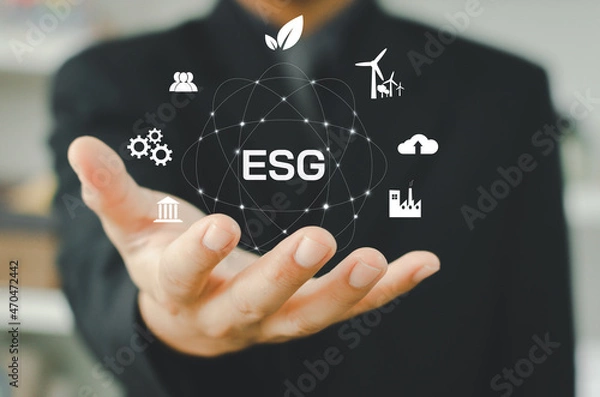 Fototapeta Environmental, social, and governance (ESG) investment Organizational growth that is sustainable is a business idea.  man's on icon  ESG word on hand a virtual screen.