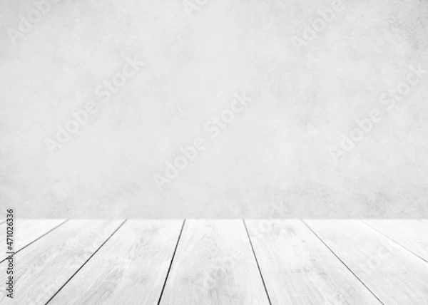 Fototapeta Empty white wood table top and blur wall. Wall Texture Background. Building banner mock up abstract background - can used for display or montage your products.