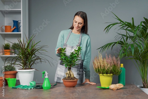 Fototapeta Woman giving gardening classes