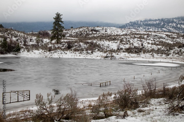 Fototapeta Frozen lake in the mountains