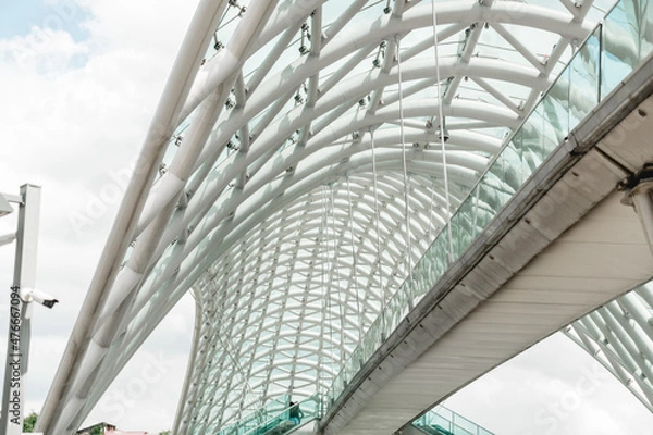 Fototapeta View of the modern glass Peace Bridge Tbilisi, Georgia