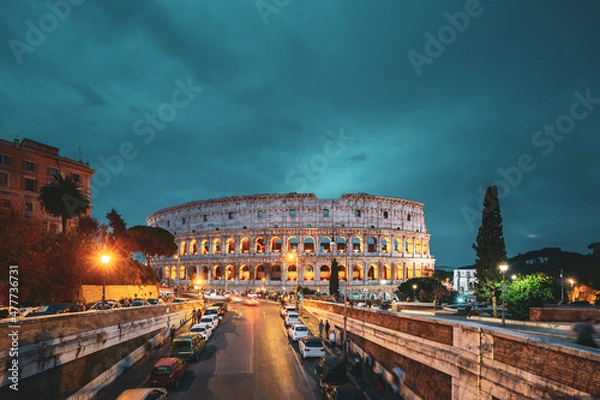 Fototapeta Rome, Italy. Colosseum Also Known As Flavian Amphitheatre In Evening Or Night Time