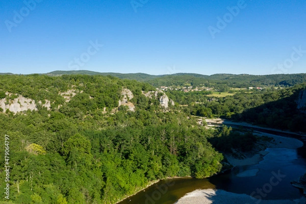 Fototapeta The Gorges de lArdeche and its river in the middle of forests in Europe, France, Ardeche, in summer, on a sunny day.