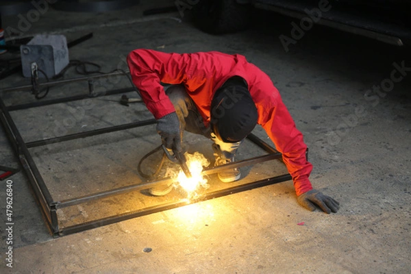 Fototapeta industry worker working in factory.