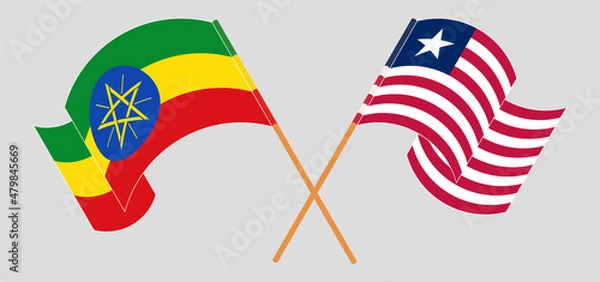 Fototapeta Crossed and waving flags of Liberia and Ethiopia