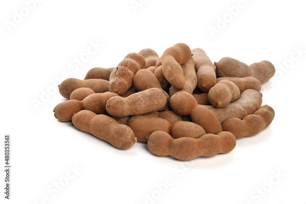 Fototapeta Sweet ripe tamarind,  isolated on white background. Close up. Tamarindus indica, Indian date