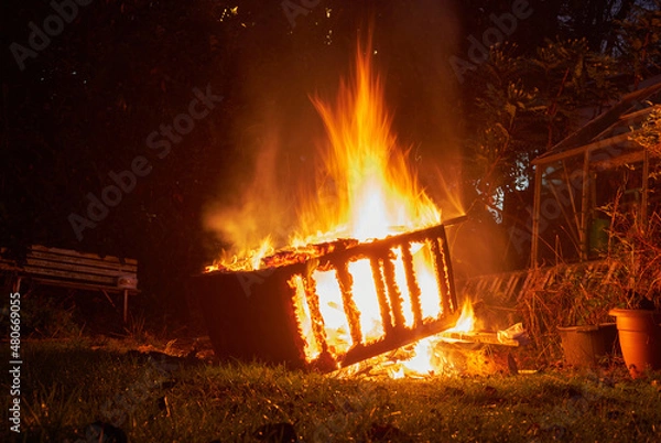 Fototapeta Old cupboard on fire image