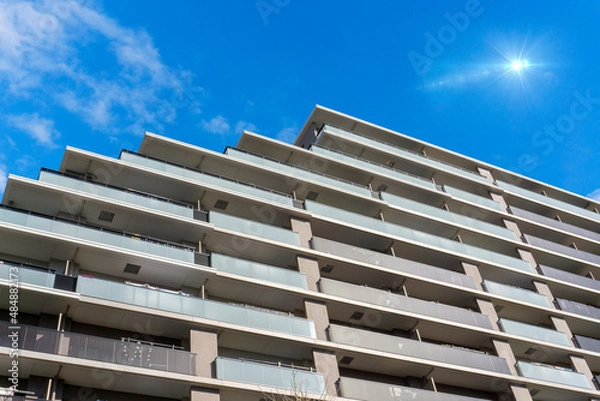 Fototapeta Exterior of high-rise condominium and refreshing blue sky scenery_sky_37