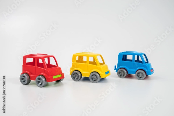 Fototapeta Multicolored plastic toy car. Buses. Equipment.