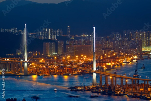 Fototapeta Freeway in night with cars light in modern city