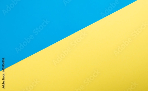 Fototapeta Top view on blue and yellow color Ukrainian flag paper background