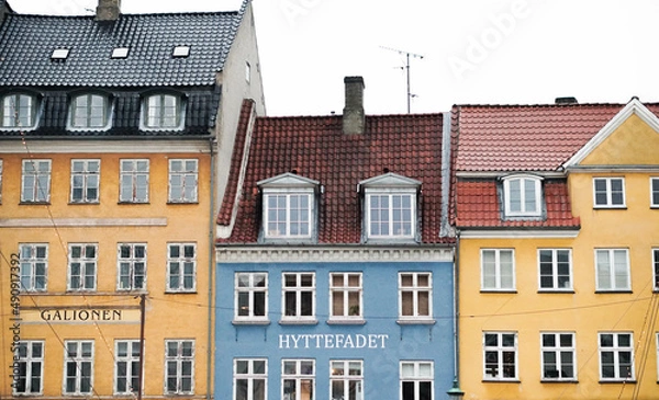 Fototapeta Streets of Copenhagen, Denmark. Houses and streets of Copenhagen. City landscape. Traditional architecture in Copenhagen, Denmark