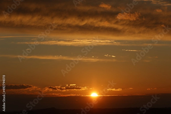 Fototapeta panoramic sunset with sun and clouds