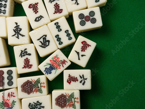 Fototapeta The mahjong on table ancient asian board game close up image