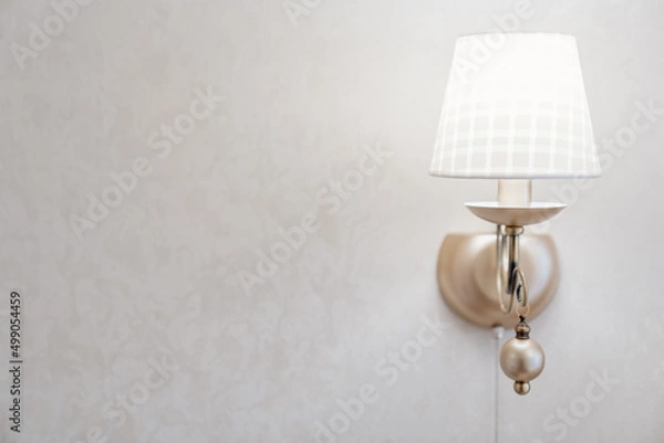 Obraz Beautiful classic sconces with a lampshade for a classic retro interior.