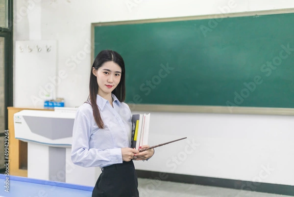 Obraz Indoor commercial portrait of a female teacher