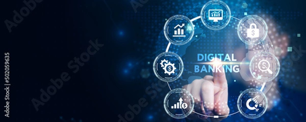 Fototapeta Business, technology, internet and networking concept. Young businessman working on his tablet in the office, select the icon digital banking on the virtual display.