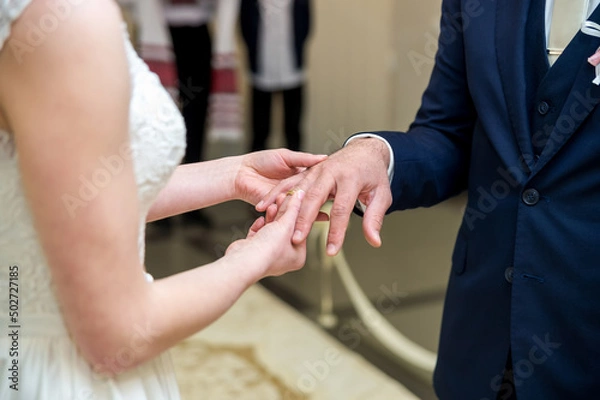 Fototapeta Romantic marriage young couple. Bridal couple hands.