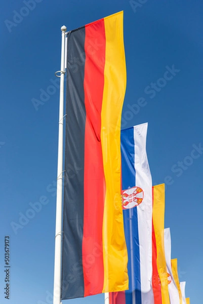 Fototapeta German and Serbian flags. Government, politics, diplomacy, trade, foreign relations between european countries