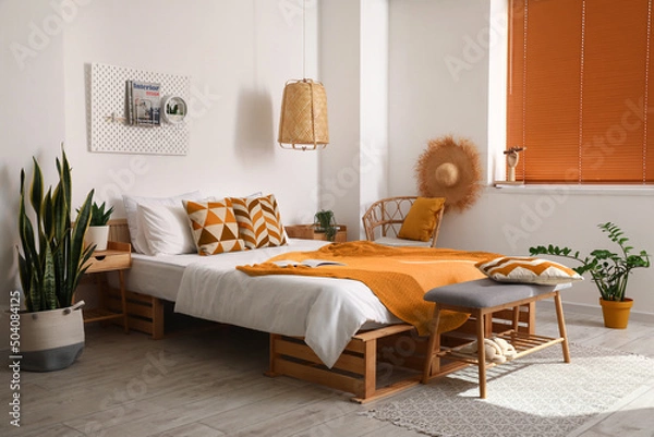 Obraz Interior of stylish room with bed and banquette