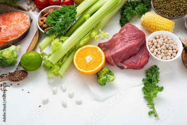 Obraz Red meat fish and vegetables background protein food