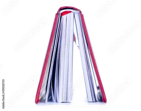 Obraz Red diary notebook on white background isolation