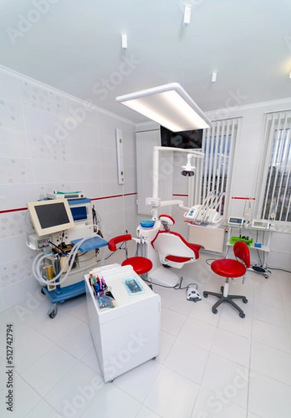 Fototapeta Dentistry light modern room. Interior of white medical room with special equipment.