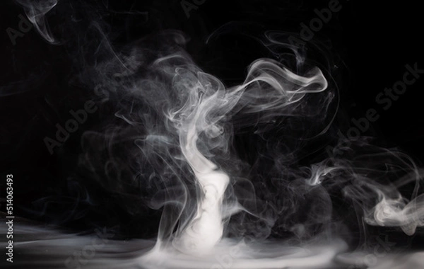 Fototapeta Abstract smoke on a dark background . Isolated .