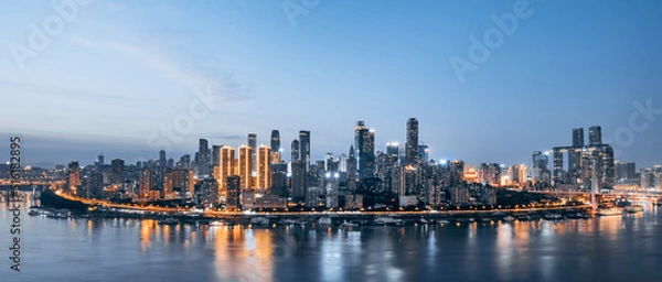 Obraz High-angle night scenery of tall buildings along the Yangtze River in Chongqing, China