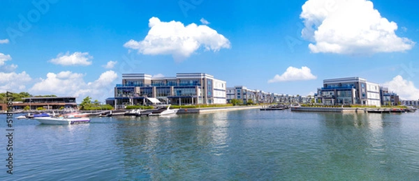 Fototapeta Scenic Innisfil marina and yacht club on Ontario Lake Simcoe with hotels and boat rentals.