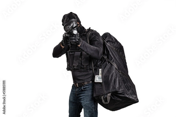 Fototapeta robber with a gun and a bag of money isolated on white background