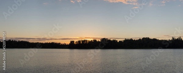 Fototapeta evening on the forest lake