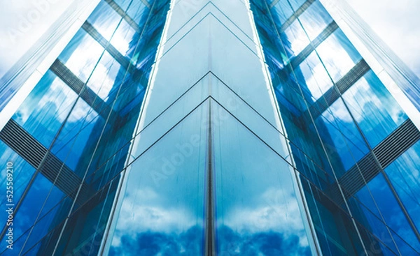 Fototapeta underside panoramic and perspective view to steel blue glass high rise building skyscrapers