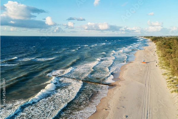 Fototapeta Drone aerial view of sea seashore landscape with sand beach without people, Baltic sea coastline in Poland