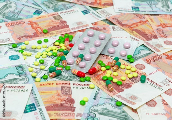 Fototapeta medical drugs on the background of banknotes