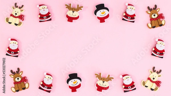 Obraz Creative cute frame with Santa Clous reindeer and snowman stickers. Copy space flat lay