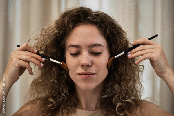 Fototapeta Face massage with brushes.