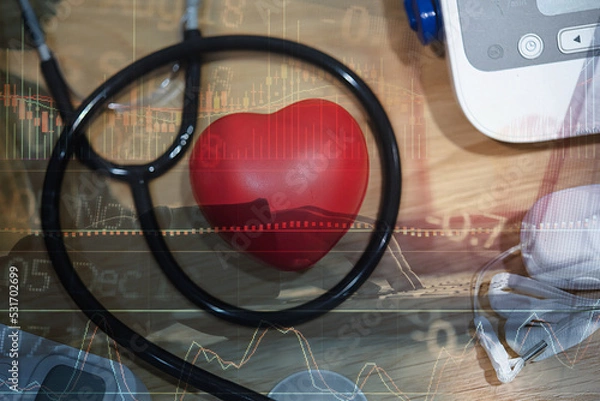 Fototapeta Red heart to represent the valentine day greeting card. The face mask, stethoscope, red heart on a white background on the table. for health care and medical management.