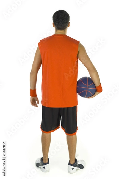 Fototapeta Young basketball player standing backwards