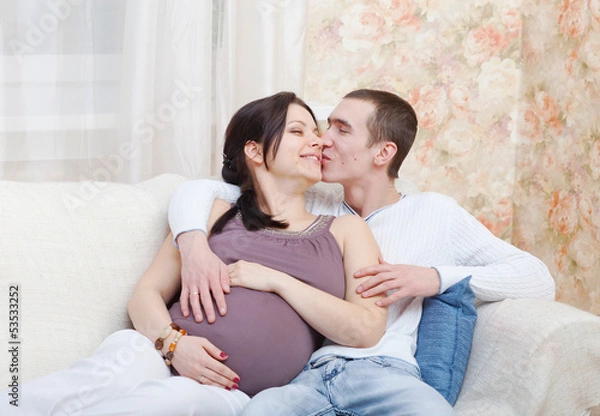 Fototapeta Happy pregnant woman with the husband