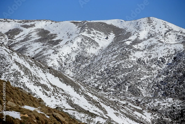 Fototapeta Snow-capped mountains in the Crete (in the Askifou region)