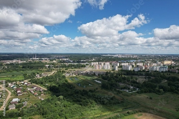 Fototapeta Aerial view of urban development from the side of the meadow. Suburb of Pinsk, Belarus.