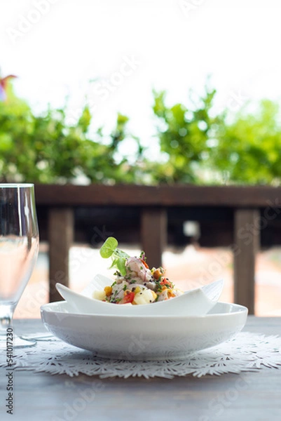 Fototapeta Ceviche dish made with white fish, lots of lemon and toasted corn