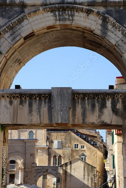 Fototapeta The Silver Gate landmark and various historic buildings in central Split, Croatia.