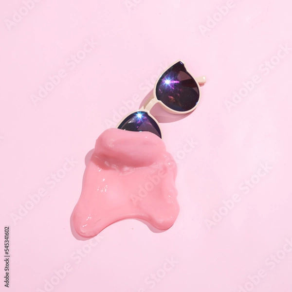 Obraz Creative minimalist layout. Sunglasses with slime on a pink background. Surreal summer idea. Conceptual pop