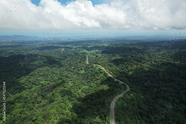 Fototapeta Green hills with road to Managua landscape