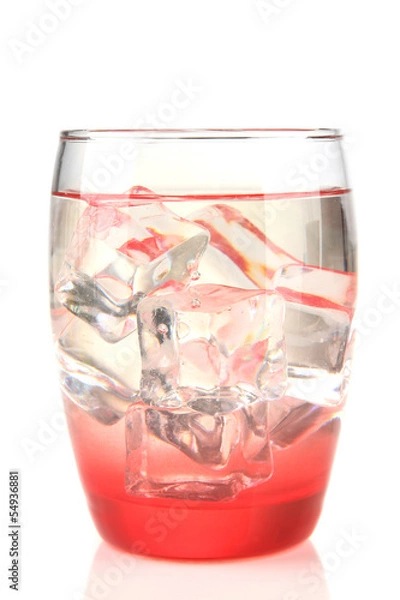 Fototapeta Glass with water and ice isolated on white